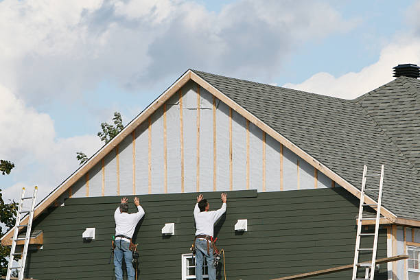 Professional Siding technician working in Churchville, PA